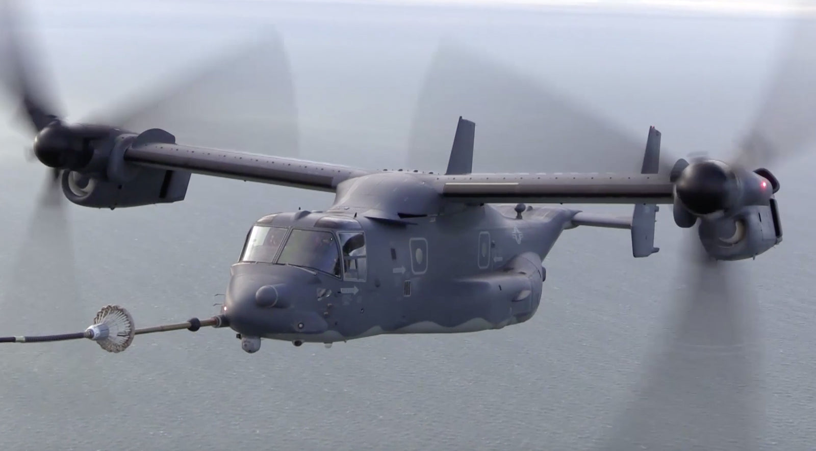 CV-22 Osprey performing tilt-rotor air to air refueling U.S. Air Force