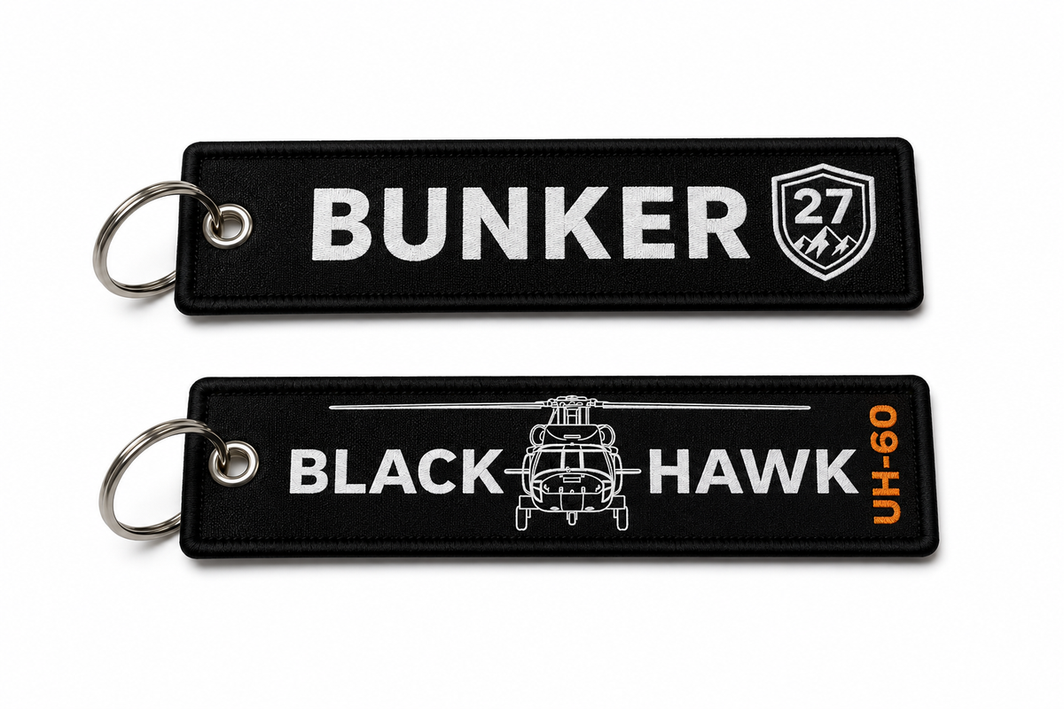 Two black keychains with 'Bunker' and 'Black Hawk UH-60' text on a white background