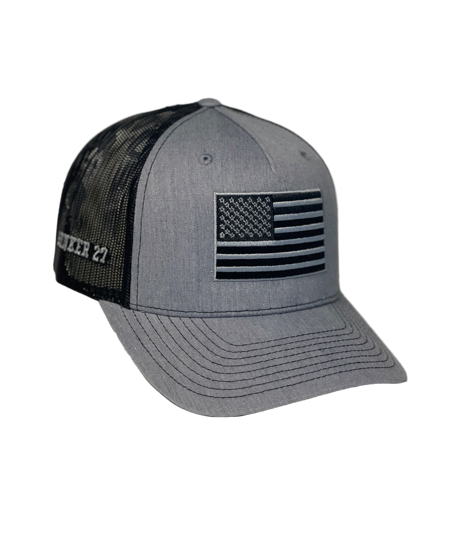 Gray cap with black mesh back and American flag design on a white background