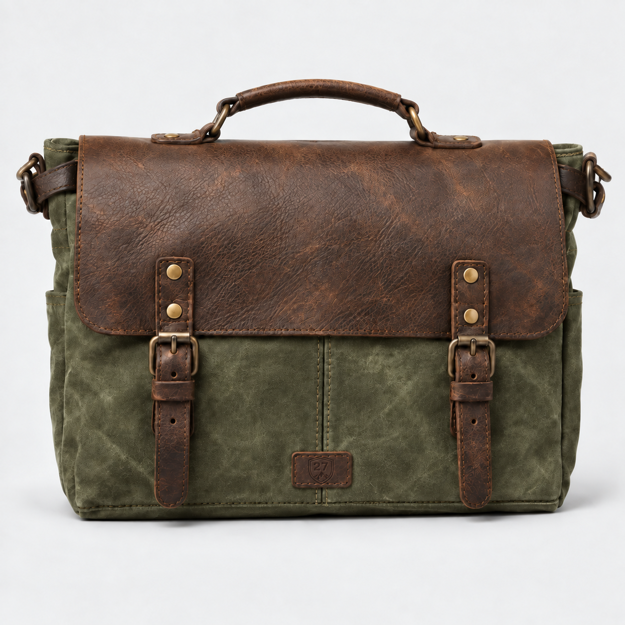 A rustic messenger bag featuring a distressed brown leather top flap with buckle straps and a textured olive green canvas body, shown against a plain light gray background.
